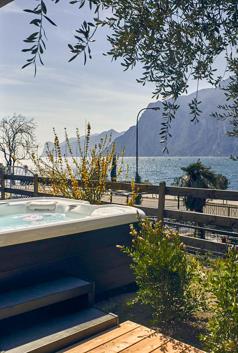 Hot tub with lake view. Buy a gift card for a relaxing vacation.