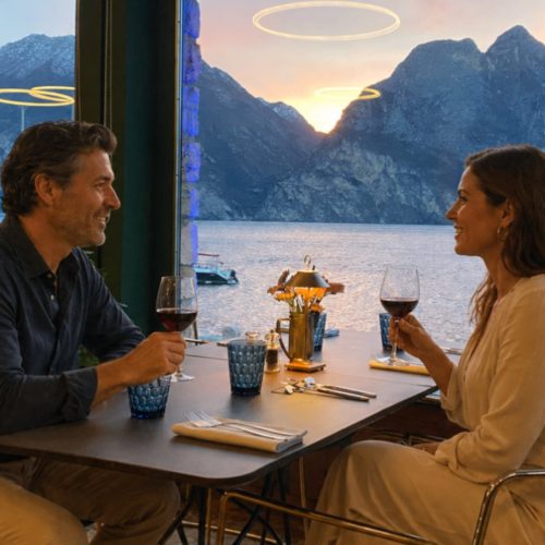 Romantic dinner with wine and lake views. Couple enjoying a naturally beautiful setting.